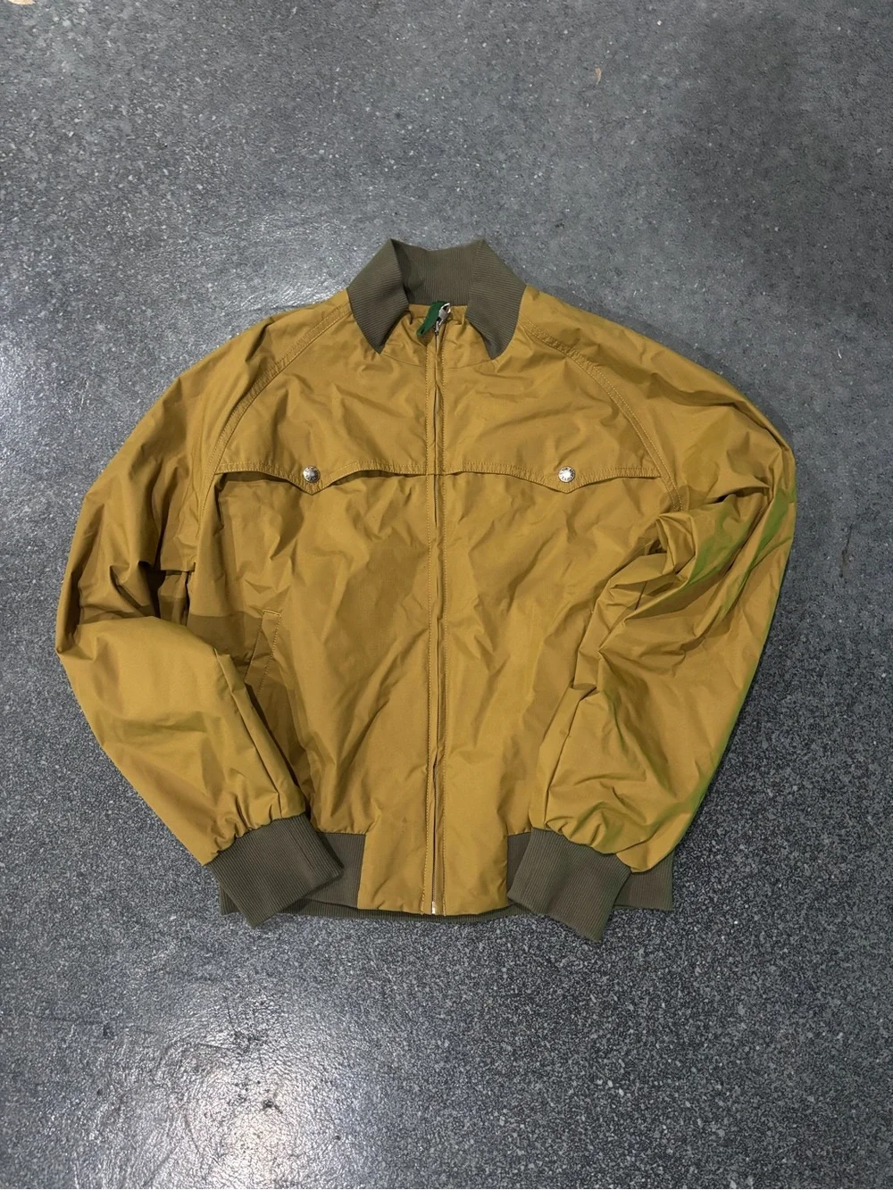 The North Face Olive Green Bomber Jacket with Logo Patch with garment bag & box